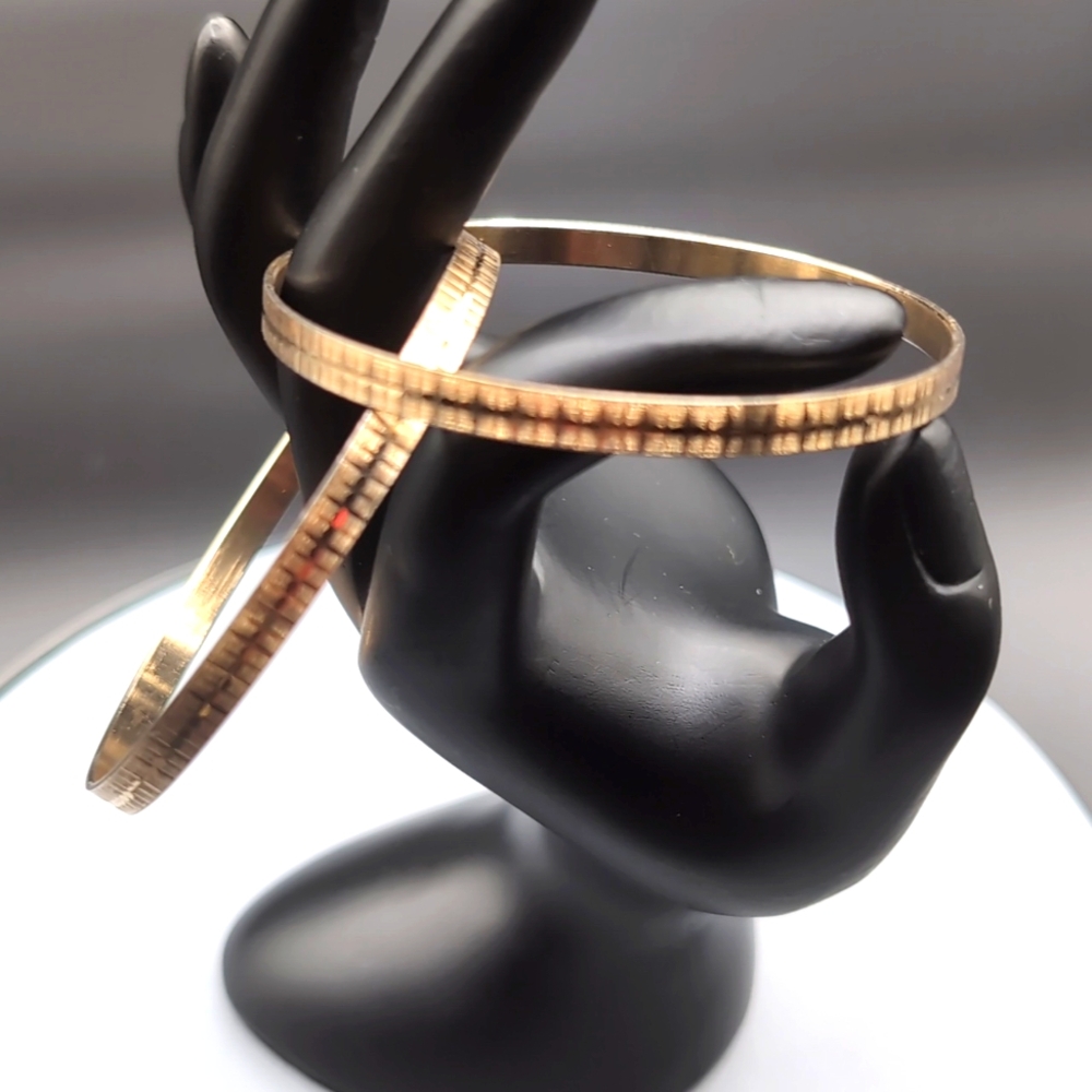 2 Gold Toned Textured Bangle Jingle Bracelets